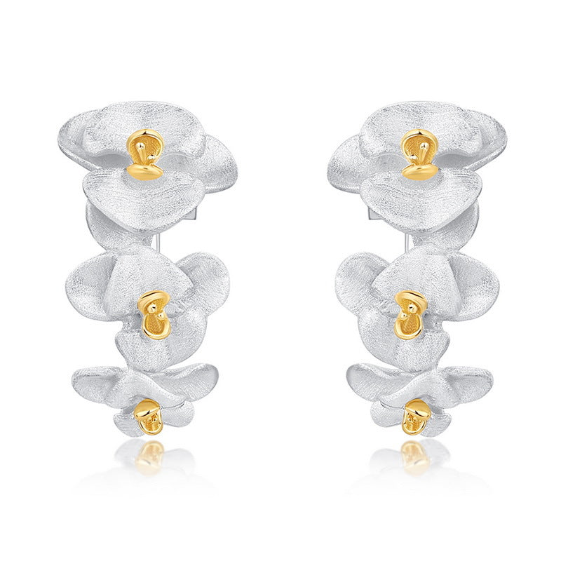 Origsoul sterling silver earrings with layered flower design and gold accents