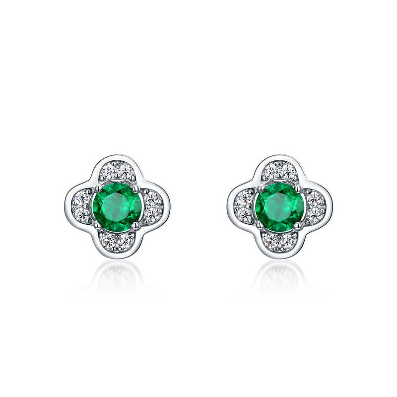 Origsoul sterling silver earrings with green gemstone center and surrounding clear crystals