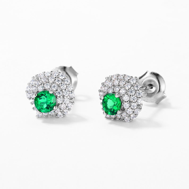 Origsoul sterling silver earrings featuring green gemstones surrounded by sparkling clear crystals