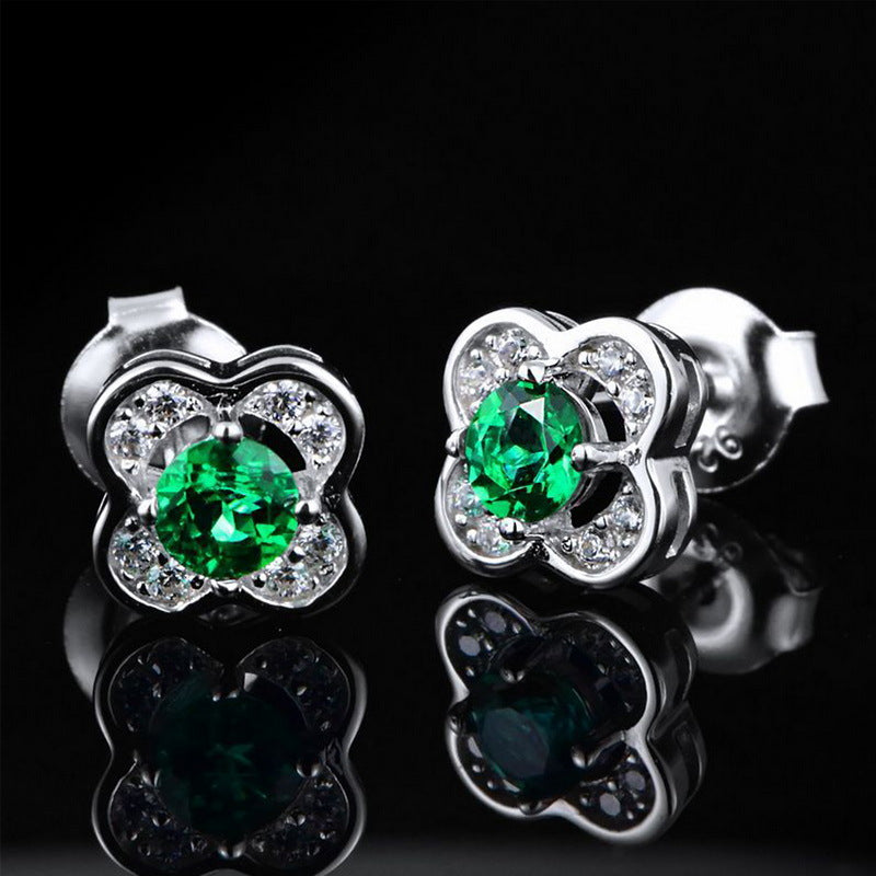 Origsoul sterling silver earrings with green center stones and surrounding clear crystals