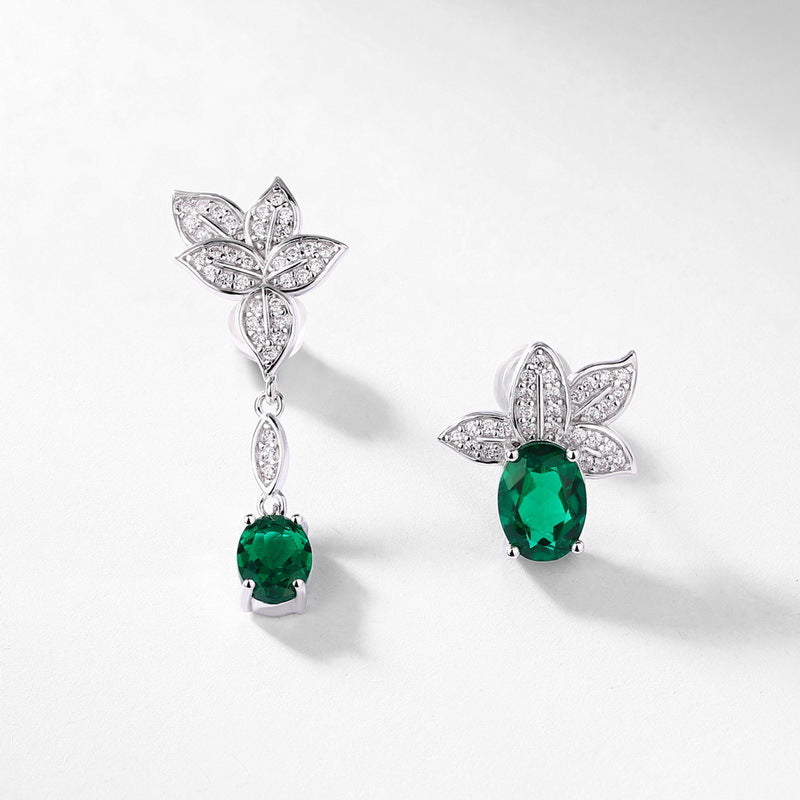 Origsoul sterling silver earrings with green oval gemstones and leaf-shaped crystal accents