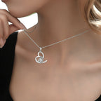 Origsoul sterling silver elephant heart necklace featuring a unique design on a delicate chain