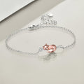 Origsoul sterling silver fox bracelet with rose gold fox charm on delicate silver chain