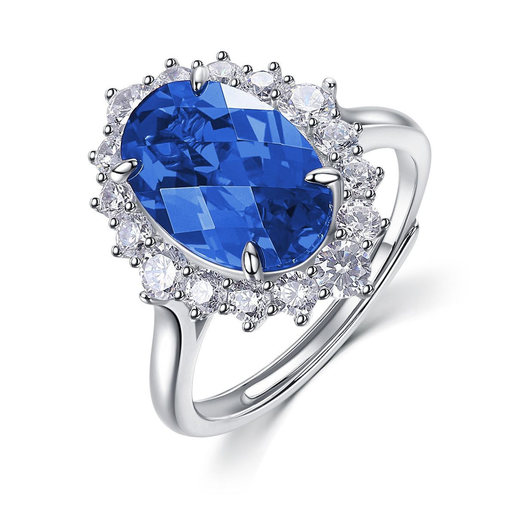 Origsoul sterling silver jelwery ring with large blue oval gemstone and surrounding clear crystals