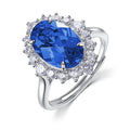 Origsoul sterling silver jelwery ring with large blue oval gemstone and surrounding clear crystals