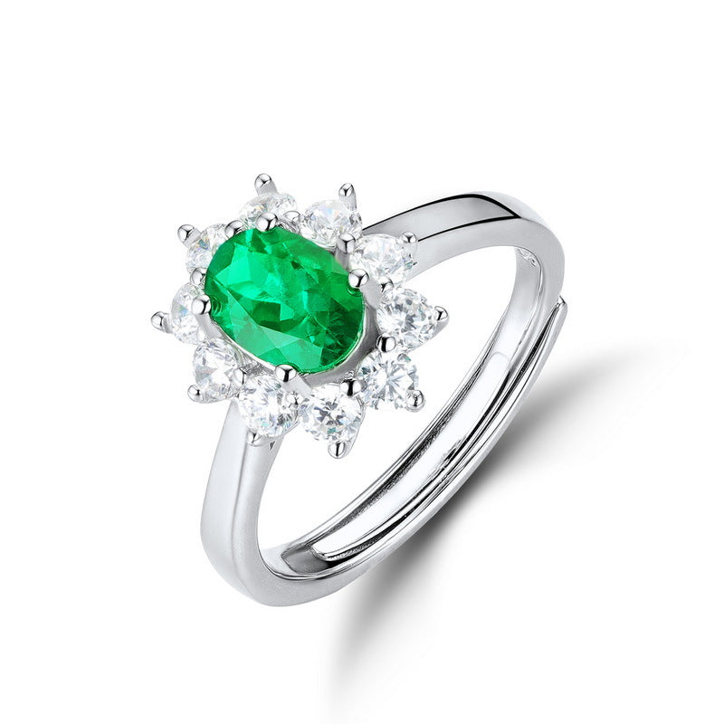 Origsoul sterling silver jelwery ring with green emerald center and clear crystal accents
