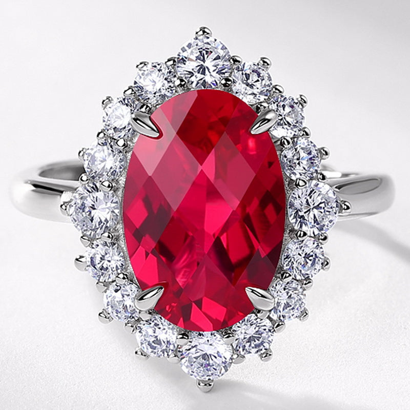 Origsoul sterling silver jelwery ring with oval red gemstone surrounded by clear crystals