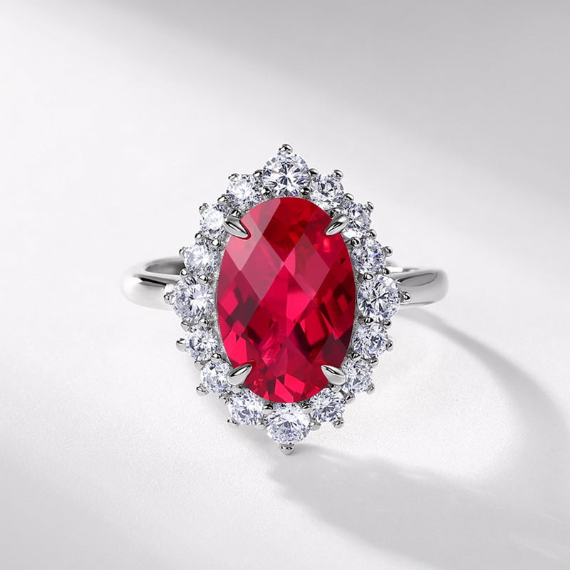 Origsoul sterling silver jelwery with large oval red gemstone surrounded by clear crystals ring