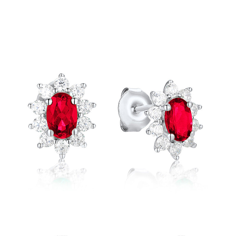 Origsoul sterling silver jelwery stud earrings with red oval gemstones surrounded by clear crystals