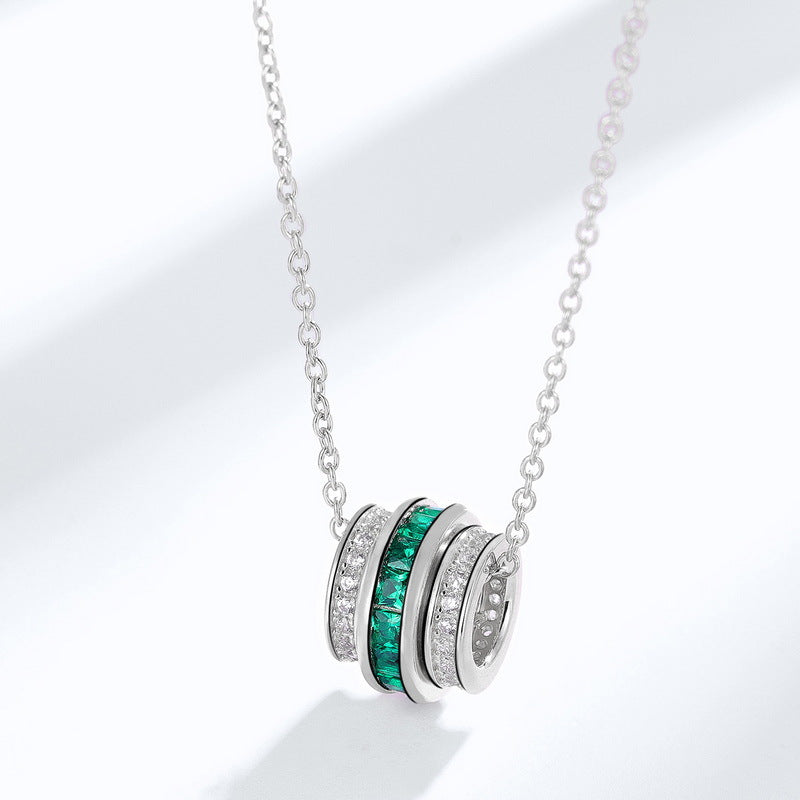 Origsoul sterling silver jelwery necklace with green and clear gemstone rings on a silver chain