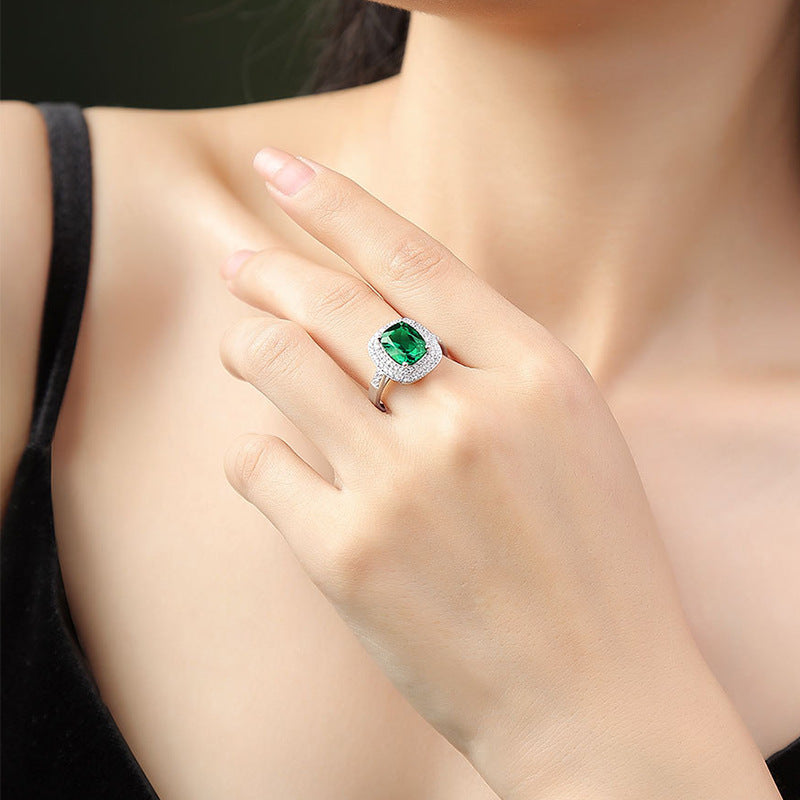 Origsoul sterling silver jelwery ring with green gemstone worn on hand