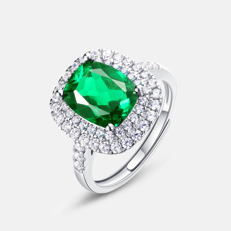 Origsoul sterling silver jelwery ring with a large green gemstone surrounded by clear crystals