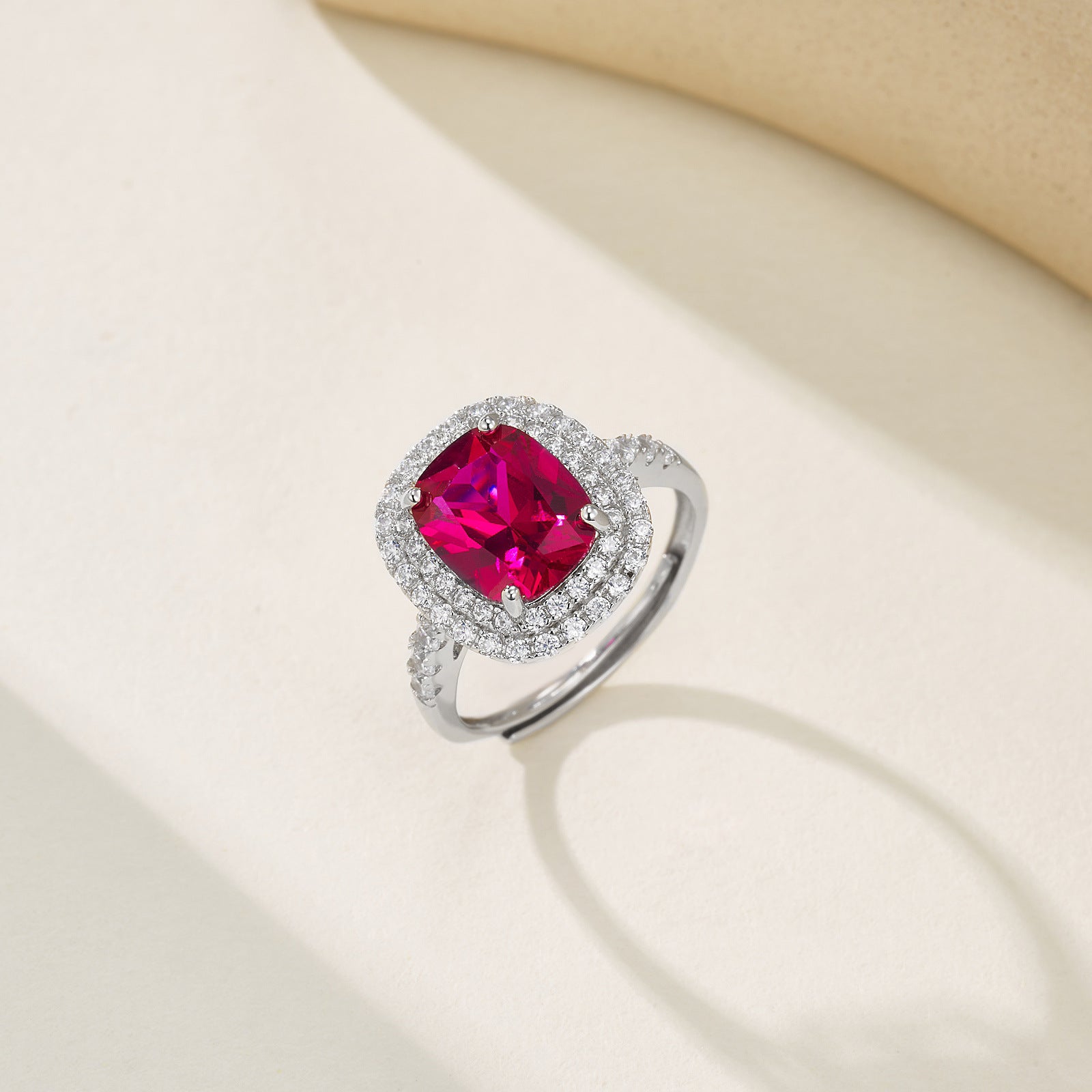 Origsoul sterling silver jelwery ring with large red gemstone surrounded by small clear stones