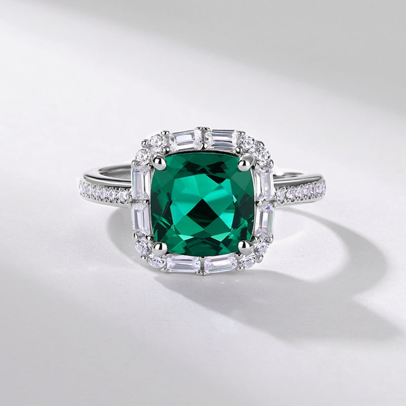 Origsoul sterling silver jelwery ring with a square green gemstone and clear crystals on band