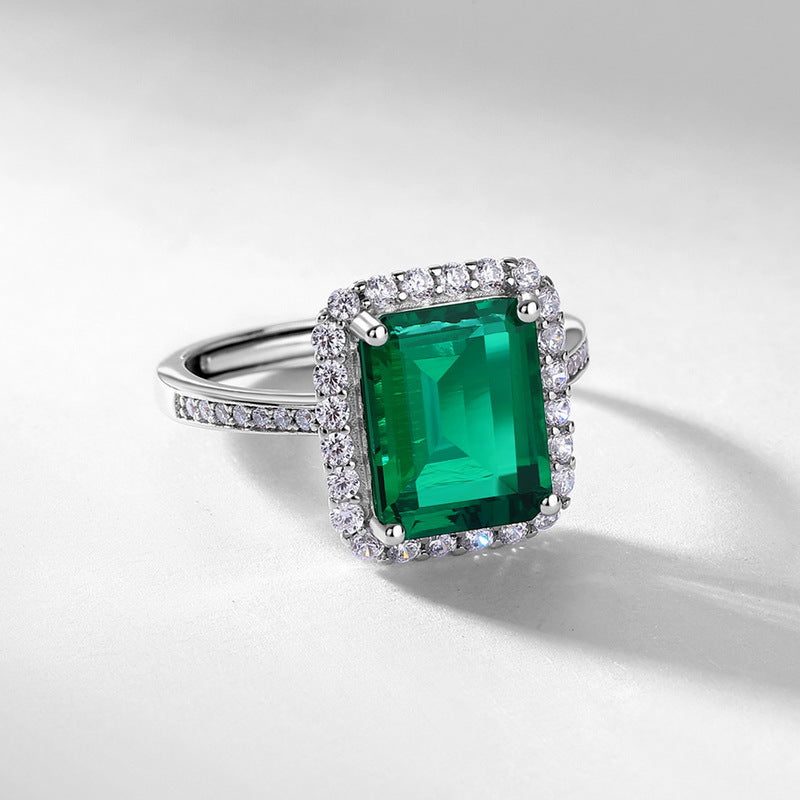 Origsoul sterling silver jewerly ring with large emerald green rectangular stone and surrounding clear stones
