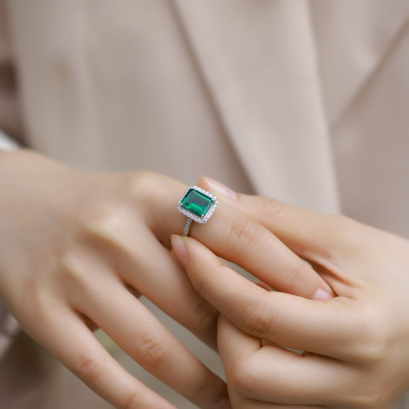 Origsoul sterling silver jewerly emerald green gemstone ring with halo setting on finger