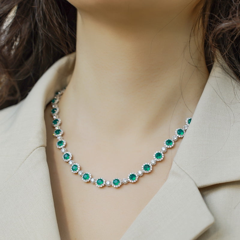Origsoul sterling silver jewerly necklace with green and white gemstone accents worn on model