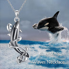 Sterling silver killer whale necklace with a sleek design showcasing orca movement and ocean waves