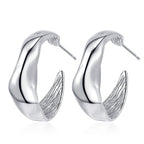 Origsoul modern bumpy hoop earrings in silver with smooth and textured design for stylish look