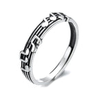 Origsoul silver music note eternity ring with detailed musical notes and staff design