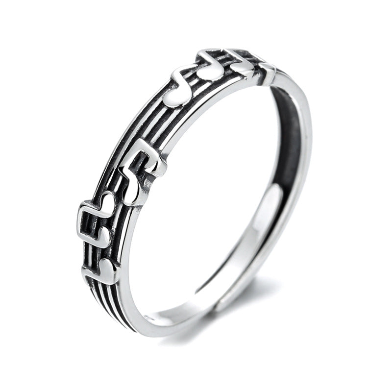 Origsoul silver music note eternity ring with detailed musical notes and staff design