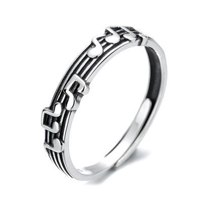 Origsoul silver music note eternity ring with detailed musical notes and staff design