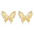 Origsoul gold butterfly stud earrings with crystal accents complementing sterling silver necklace