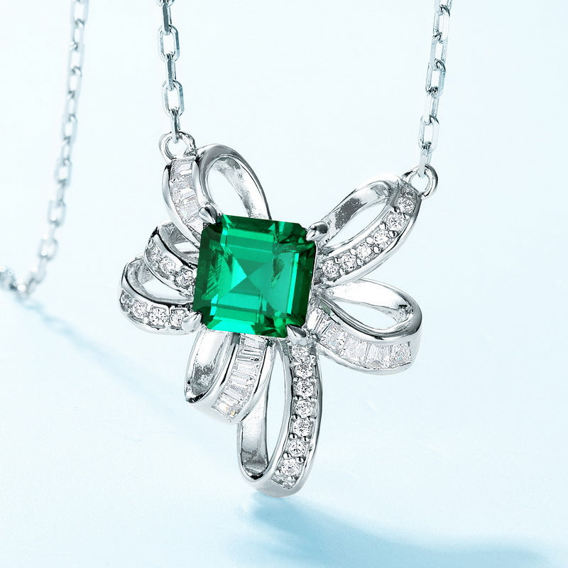 Origsoul sterling silver necklace with green square gemstone and decorative loops with small clear stones