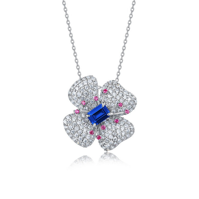 Origsoul sterling silver necklace with flower pendant featuring blue and pink gemstones