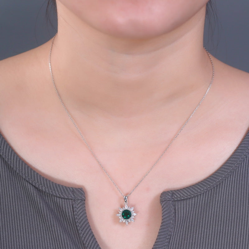 Origsoul sterling silver necklace with green gemstone pendant worn on neckline