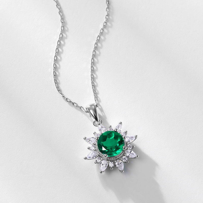 Origsoul sterling silver necklace with green gemstone and clear crystal floral pendant