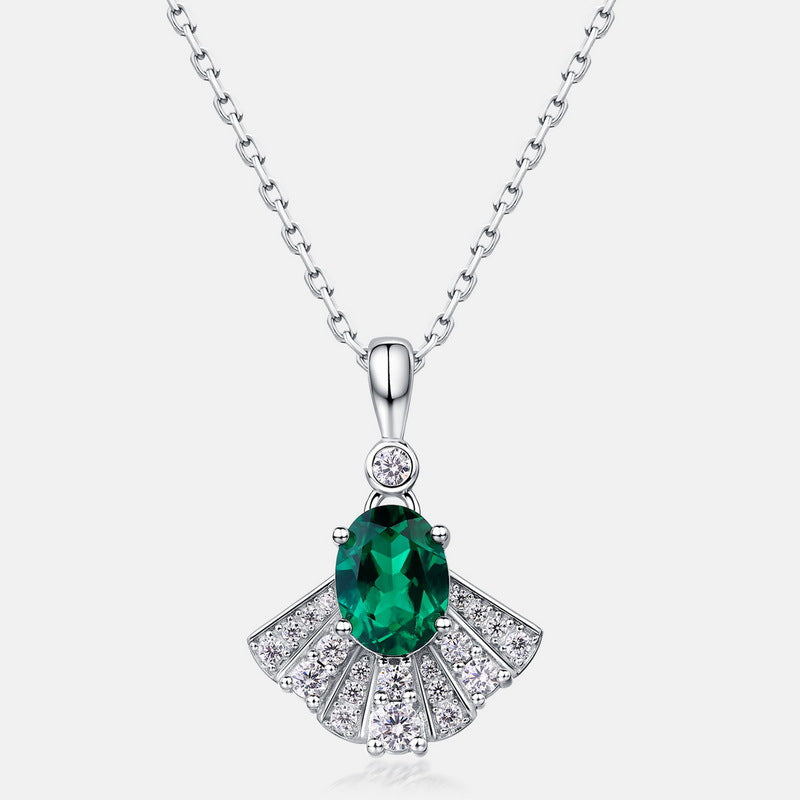 Origsoul sterling silver necklace with green oval gemstone and intricate clear crystal fan-shaped pendant
