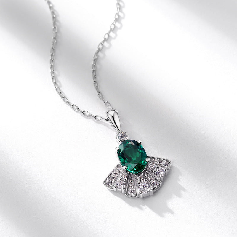 Origsoul sterling silver necklace with green oval gemstone and fan-shaped crystal accents