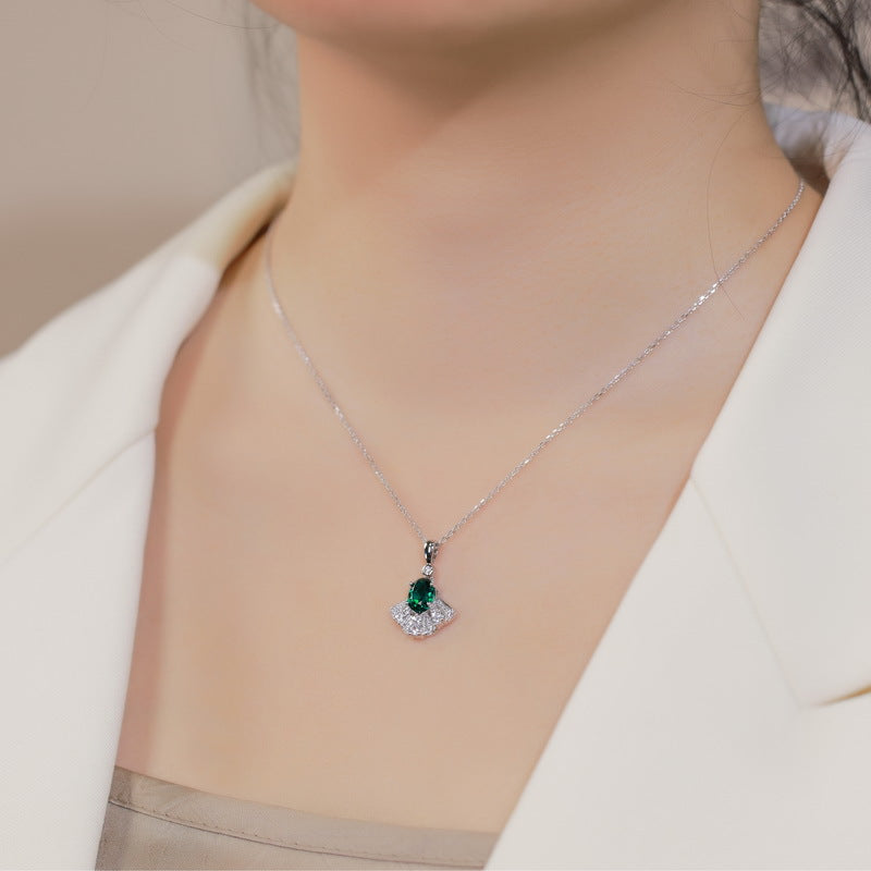 Origsoul sterling silver necklace with green gemstone pendant worn on neck