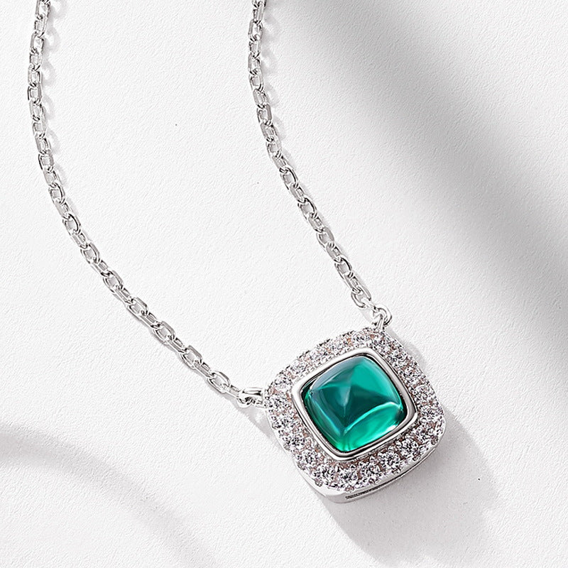 Origsoul sterling silver necklace with green gemstone pendant surrounded by small clear crystals