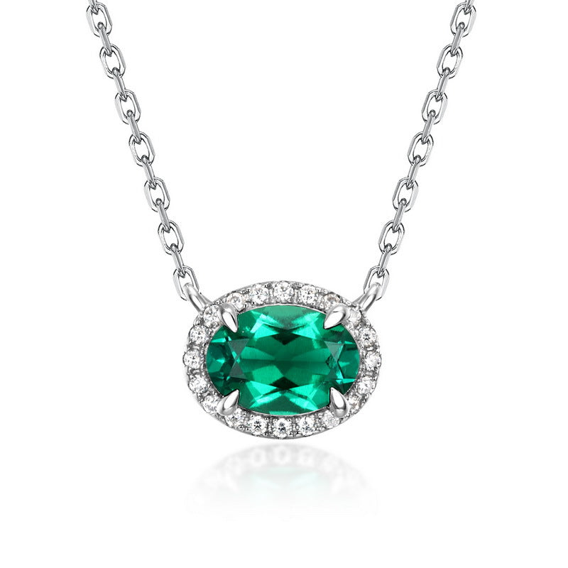 Origsoul sterling silver necklace with oval green gemstone and surrounding clear crystals