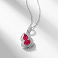Origsoul sterling silver necklace with heart-shaped red gemstones and clear crystal accents
