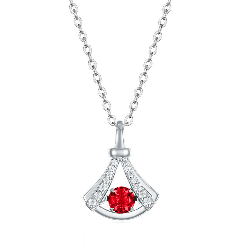 Origsoul sterling silver necklace with a red gemstone and small clear crystals pendant