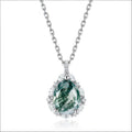Origsoul sterling silver necklace with teardrop green gemstone surrounded by clear crystals