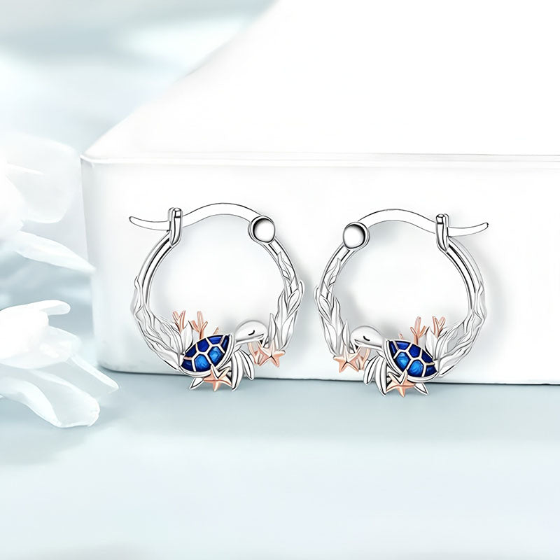 Origsoul sterling silver ocean turtle earrings featuring blue enamel and coral details