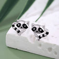 Cute sterling silver raccoon earrings featuring playful raccoon design with black accents