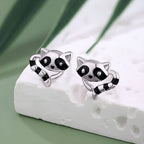 Cute sterling silver raccoon earrings featuring playful raccoon design with black accents