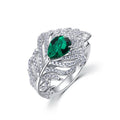 Origsoul sterling silver ring with green teardrop gemstone and intricate crystal accents