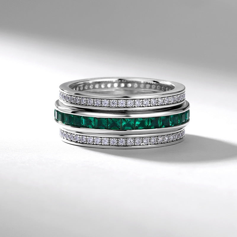 Origsoul sterling silver ring with green square gemstones and sparkling clear stones in a stacked design