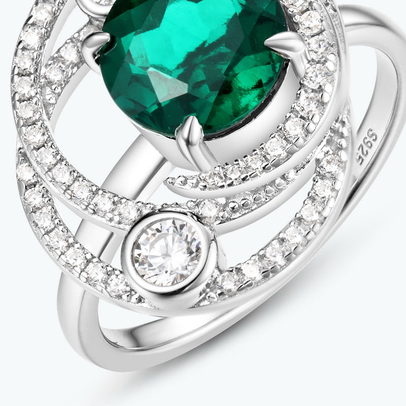 Origsoul sterling silver ring jewellery with green emerald center and surrounding clear stones
