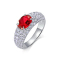 Origsoul sterling silver ring with a large red gemstone and small clear crystals on the band
