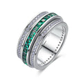 Origsoul sterling silver ring with green and clear gemstones in a multi-row design