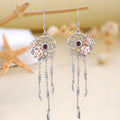 Origsoul sterling silver rose flower dreamcatcher earrings with detailed design and cascading chains