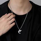 Stylish sterling silver shark pendant necklace worn by a model for trendy jewelry lovers