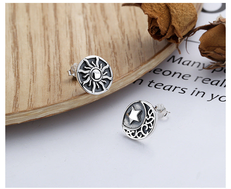Origsoul cosmic jewelry sun and moon stud earrings in silver with intricate celestial designs